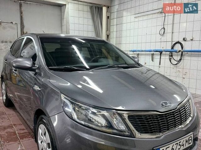 Сірий Кіа Ріо, об'ємом двигуна 1.4 л та пробігом 152 тис. км за 7500 $, фото 1 на Automoto.ua