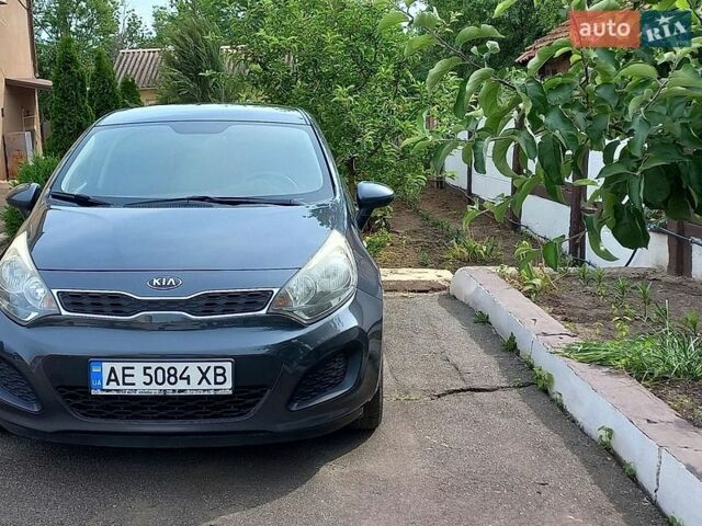 Серый Киа Рио, объемом двигателя 1.12 л и пробегом 198 тыс. км за 6400 $, фото 1 на Automoto.ua