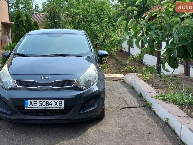 Сірий Кіа Ріо, об'ємом двигуна 1.12 л та пробігом 198 тис. км за 6500 $, фото 1 на Automoto.ua