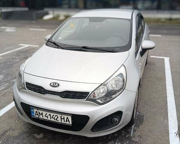 Сірий Кіа Ріо, об'ємом двигуна 1.12 л та пробігом 196 тис. км за 7500 $, фото 1 на Automoto.ua