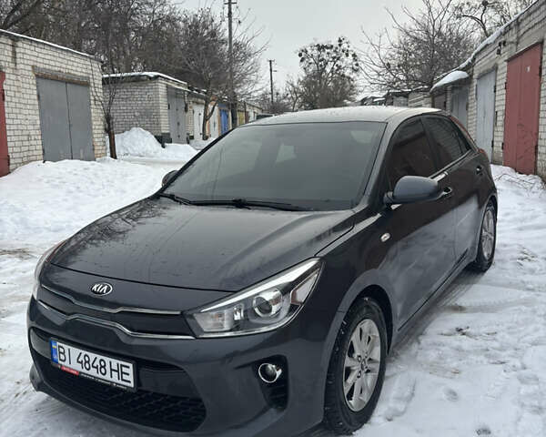 Сірий Кіа Ріо, об'ємом двигуна 1.4 л та пробігом 76 тис. км за 14200 $, фото 1 на Automoto.ua