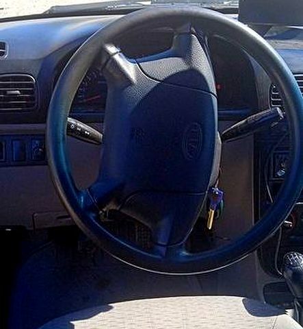 Серый Киа Рио, объемом двигателя 1.3 л и пробегом 0 тыс. км за 2100 $, фото 1 на Automoto.ua