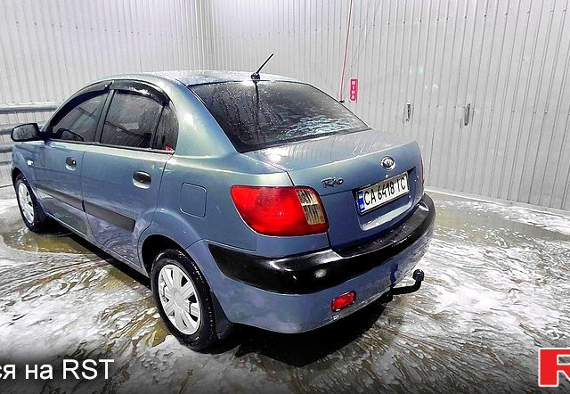Серый Киа Рио, объемом двигателя 1.4 л и пробегом 198 тыс. км за 3950 $, фото 1 на Automoto.ua