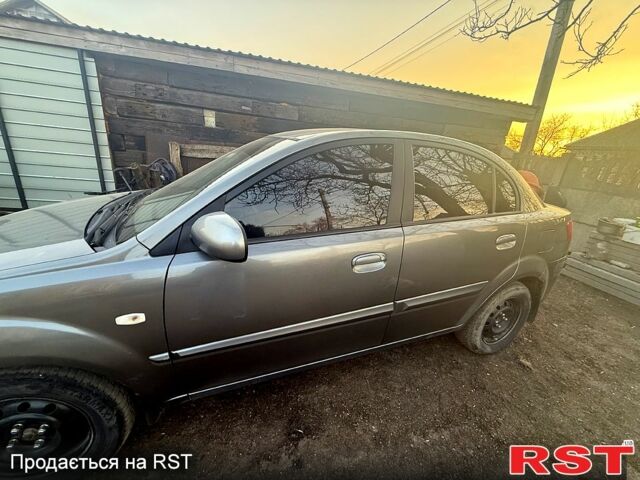 Серый Киа Рио, объемом двигателя 1.5 л и пробегом 205 тыс. км за 5000 $, фото 1 на Automoto.ua