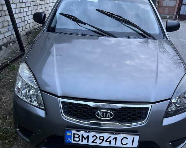 Серый Киа Рио, объемом двигателя 1.4 л и пробегом 99 тыс. км за 5500 $, фото 1 на Automoto.ua