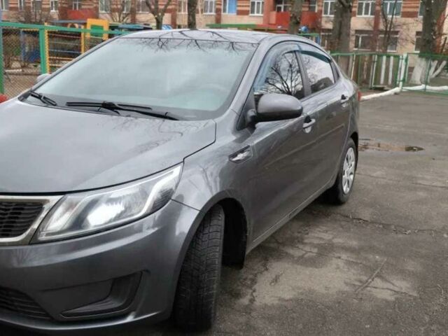 Серый Киа Рио, объемом двигателя 1.4 л и пробегом 141 тыс. км за 8500 $, фото 1 на Automoto.ua