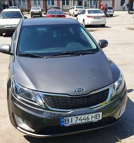Серый Киа Рио, объемом двигателя 1.6 л и пробегом 190 тыс. км за 7824 $, фото 1 на Automoto.ua