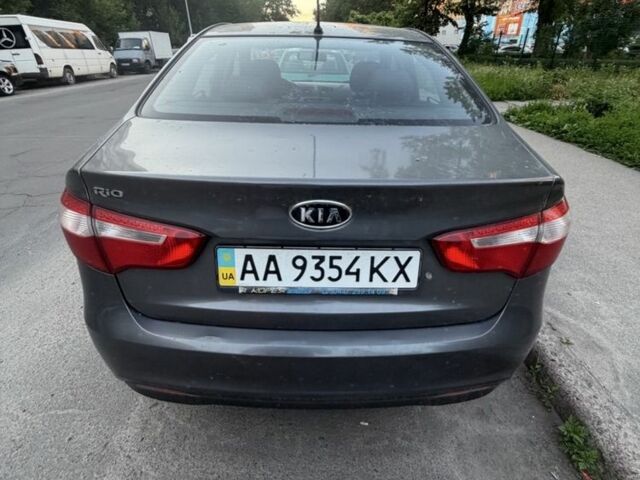Серый Киа Рио, объемом двигателя 1.4 л и пробегом 200 тыс. км за 4600 $, фото 1 на Automoto.ua