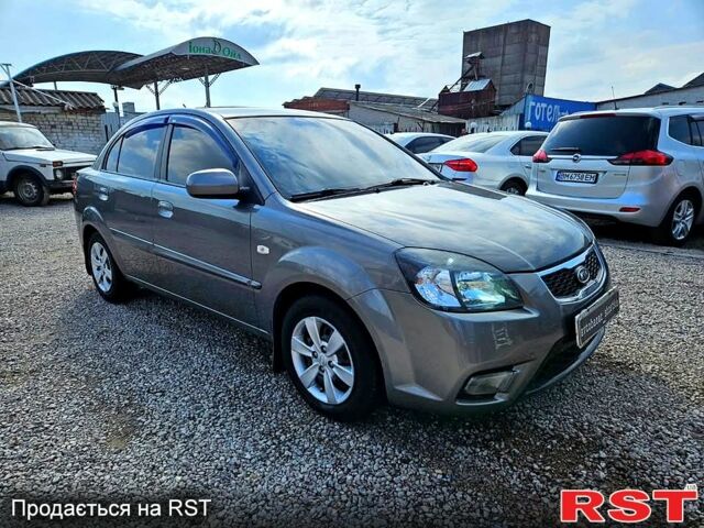Сірий Кіа Ріо, об'ємом двигуна 1.4 л та пробігом 214 тис. км за 5700 $, фото 1 на Automoto.ua