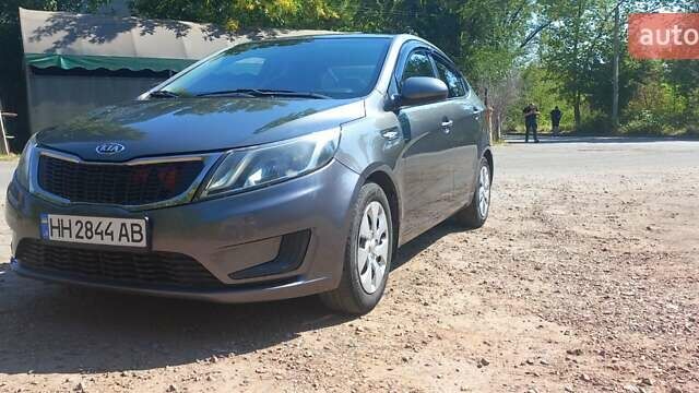 Серый Киа Рио, объемом двигателя 1.4 л и пробегом 156 тыс. км за 6600 $, фото 1 на Automoto.ua