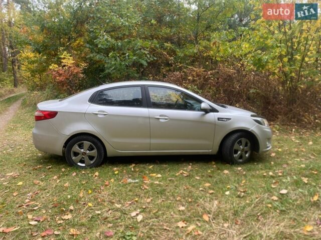 Серый Киа Рио, объемом двигателя 1.4 л и пробегом 224 тыс. км за 5400 $, фото 1 на Automoto.ua