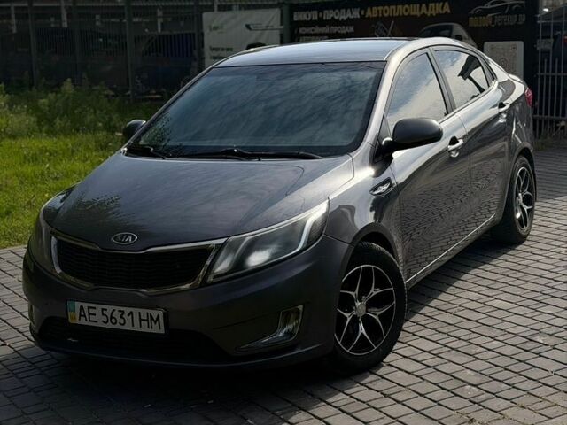 Сірий Кіа Ріо, об'ємом двигуна 1.4 л та пробігом 220 тис. км за 6700 $, фото 1 на Automoto.ua