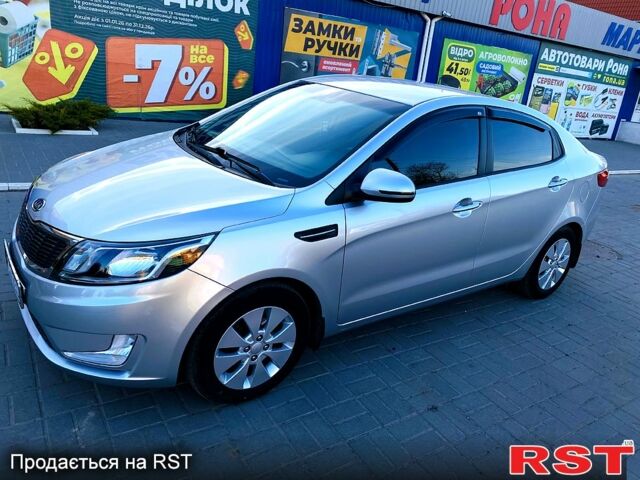 Серый Киа Рио, объемом двигателя 1.6 л и пробегом 120 тыс. км за 7600 $, фото 1 на Automoto.ua