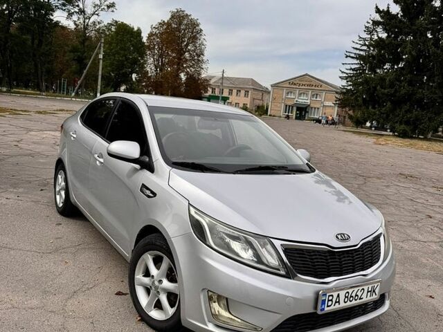 Серый Киа Рио, объемом двигателя 1.4 л и пробегом 247 тыс. км за 6900 $, фото 1 на Automoto.ua