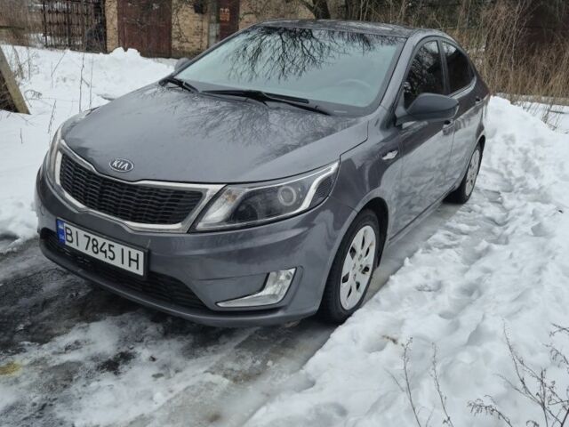 Сірий Кіа Ріо, об'ємом двигуна 1.4 л та пробігом 141 тис. км за 6706 $, фото 1 на Automoto.ua