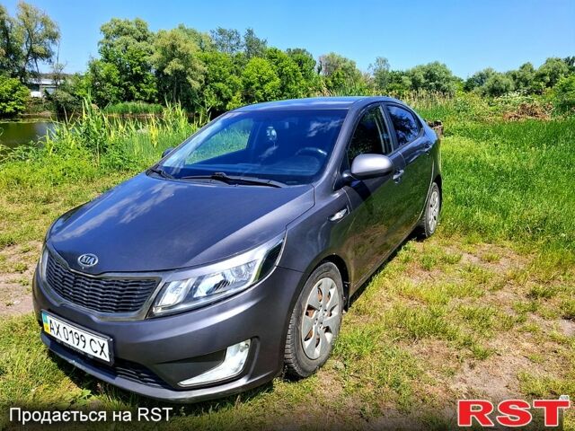 Серый Киа Рио, объемом двигателя 1.4 л и пробегом 235 тыс. км за 5600 $, фото 1 на Automoto.ua