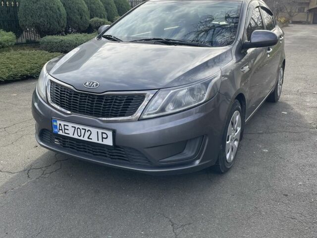 Сірий Кіа Ріо, об'ємом двигуна 1.4 л та пробігом 170 тис. км за 5999 $, фото 1 на Automoto.ua