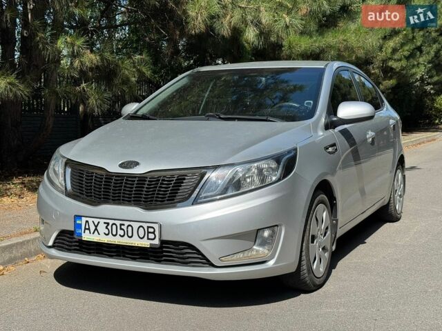 Сірий Кіа Ріо, об'ємом двигуна 1.4 л та пробігом 94 тис. км за 8799 $, фото 1 на Automoto.ua