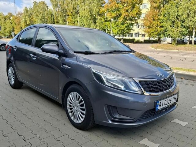 Серый Киа Рио, объемом двигателя 1.4 л и пробегом 131 тыс. км за 7900 $, фото 1 на Automoto.ua