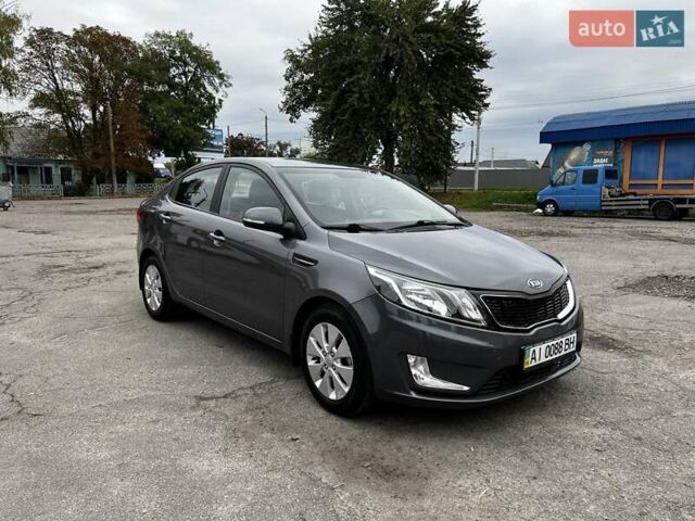 Серый Киа Рио, объемом двигателя 1.59 л и пробегом 81 тыс. км за 8900 $, фото 1 на Automoto.ua