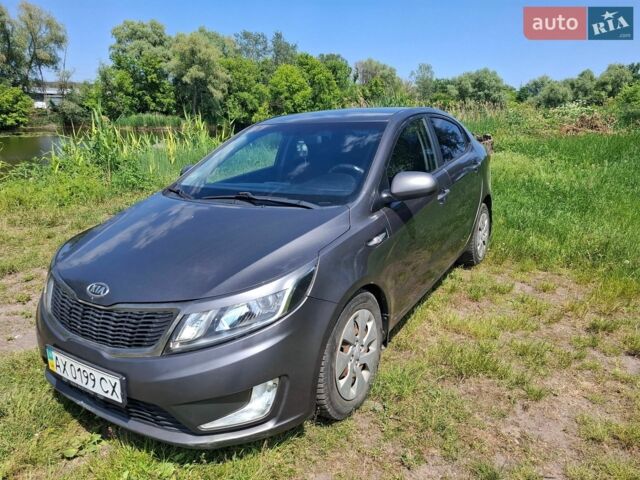 Серый Киа Рио, объемом двигателя 1.4 л и пробегом 235 тыс. км за 5600 $, фото 1 на Automoto.ua