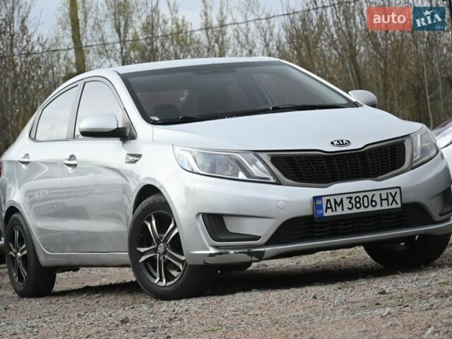 Серый Киа Рио, объемом двигателя 1.4 л и пробегом 247 тыс. км за 5800 $, фото 1 на Automoto.ua