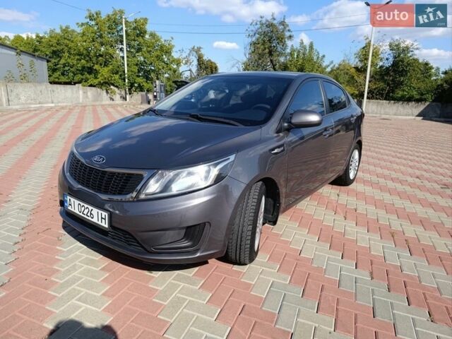 Сірий Кіа Ріо, об'ємом двигуна 1.4 л та пробігом 131 тис. км за 7500 $, фото 1 на Automoto.ua