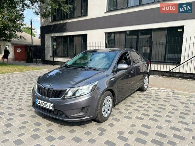 Серый Киа Рио, объемом двигателя 1.4 л и пробегом 254 тыс. км за 6500 $, фото 1 на Automoto.ua