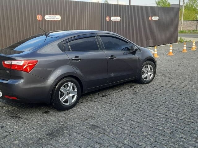 Серый Киа Рио, объемом двигателя 1.59 л и пробегом 250 тыс. км за 6500 $, фото 1 на Automoto.ua