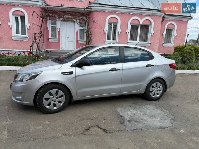 Сірий Кіа Ріо, об'ємом двигуна 1.4 л та пробігом 128 тис. км за 5800 $, фото 1 на Automoto.ua