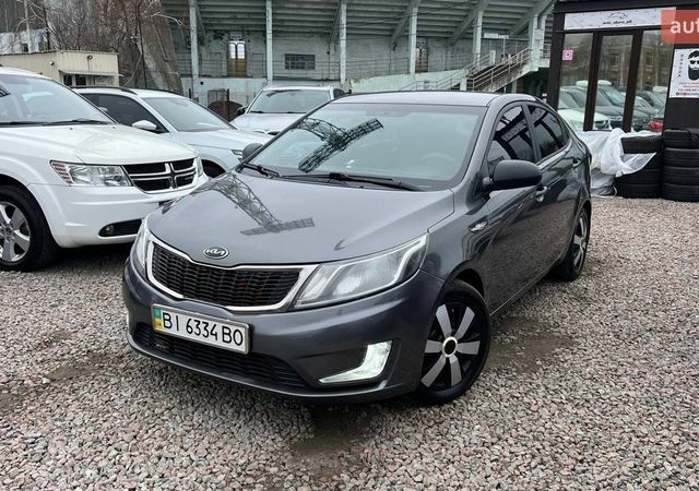 Сірий Кіа Ріо, об'ємом двигуна 1.4 л та пробігом 190 тис. км за 7500 $, фото 1 на Automoto.ua