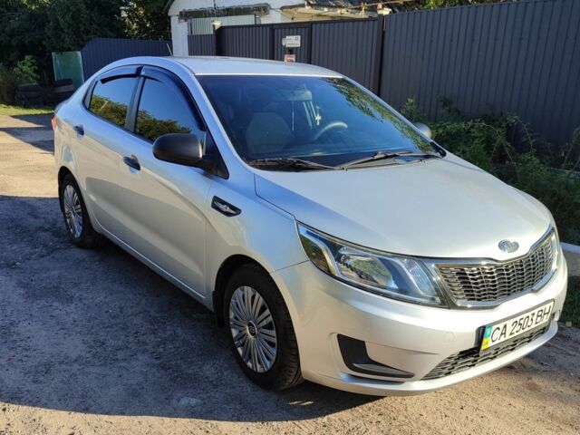 Сірий Кіа Ріо, об'ємом двигуна 1.4 л та пробігом 216 тис. км за 6802 $, фото 1 на Automoto.ua