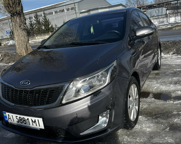 Серый Киа Рио, объемом двигателя 1.59 л и пробегом 275 тыс. км за 7000 $, фото 1 на Automoto.ua