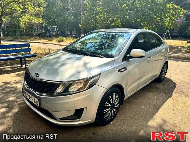 Сірий Кіа Ріо, об'ємом двигуна 1.4 л та пробігом 230 тис. км за 5999 $, фото 1 на Automoto.ua