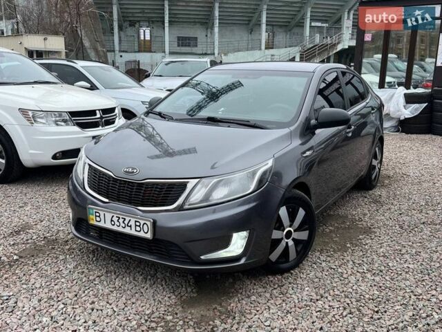 Сірий Кіа Ріо, об'ємом двигуна 1.4 л та пробігом 190 тис. км за 7250 $, фото 1 на Automoto.ua