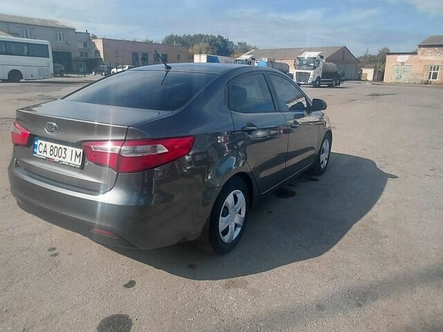 Сірий Кіа Ріо, об'ємом двигуна 1.4 л та пробігом 263 тис. км за 5800 $, фото 1 на Automoto.ua