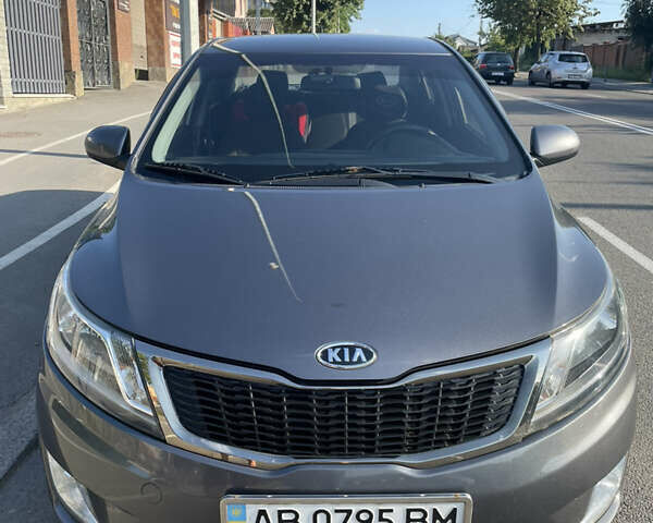 Серый Киа Рио, объемом двигателя 1.6 л и пробегом 94 тыс. км за 7600 $, фото 1 на Automoto.ua