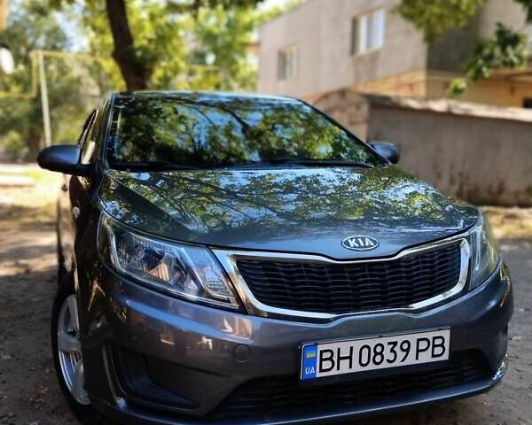 Сірий Кіа Ріо, об'ємом двигуна 1.4 л та пробігом 200 тис. км за 7000 $, фото 1 на Automoto.ua