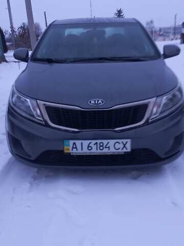 Серый Киа Рио, объемом двигателя 1.4 л и пробегом 133 тыс. км за 8200 $, фото 1 на Automoto.ua