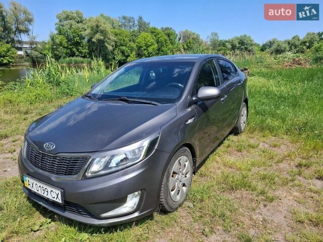 Сірий Кіа Ріо, об'ємом двигуна 1.4 л та пробігом 235 тис. км за 5600 $, фото 1 на Automoto.ua