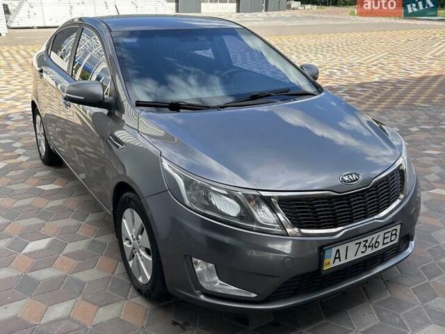 Серый Киа Рио, объемом двигателя 1.59 л и пробегом 179 тыс. км за 7900 $, фото 1 на Automoto.ua