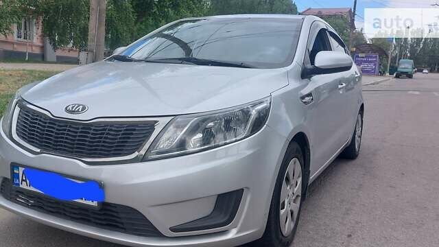 Сірий Кіа Ріо, об'ємом двигуна 1.4 л та пробігом 143 тис. км за 8200 $, фото 1 на Automoto.ua