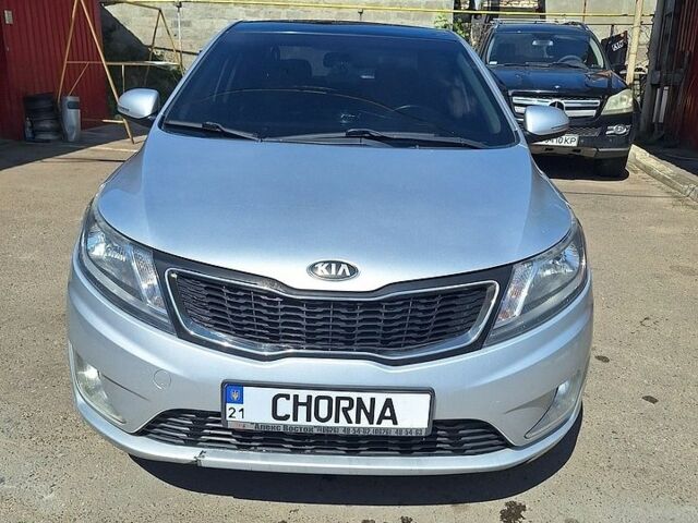 Серый Киа Рио, объемом двигателя 1.59 л и пробегом 157 тыс. км за 7500 $, фото 1 на Automoto.ua