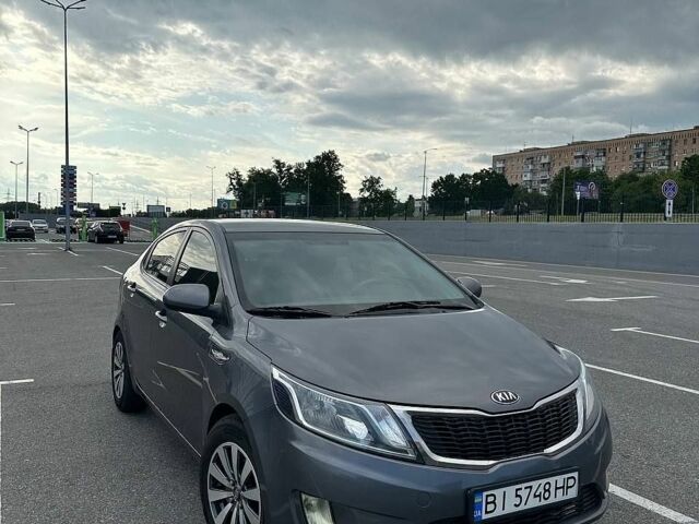 Серый Киа Рио, объемом двигателя 1.4 л и пробегом 320 тыс. км за 6300 $, фото 1 на Automoto.ua