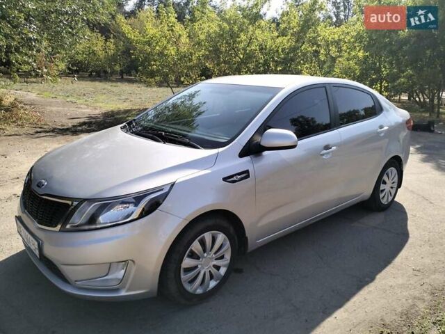Сірий Кіа Ріо, об'ємом двигуна 1.59 л та пробігом 253 тис. км за 7999 $, фото 1 на Automoto.ua