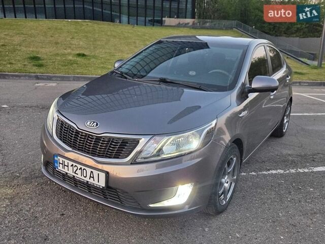 Серый Киа Рио, объемом двигателя 1.4 л и пробегом 97 тыс. км за 8700 $, фото 1 на Automoto.ua
