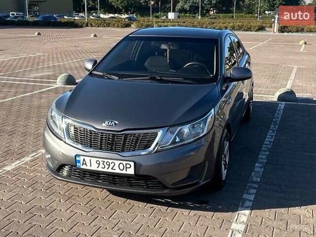 Серый Киа Рио, объемом двигателя 1.4 л и пробегом 73 тыс. км за 9500 $, фото 1 на Automoto.ua