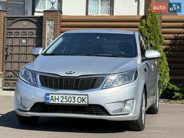 Серый Киа Рио, объемом двигателя 1.59 л и пробегом 131 тыс. км за 8800 $, фото 1 на Automoto.ua
