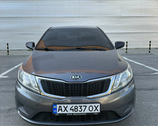 Серый Киа Рио, объемом двигателя 1.4 л и пробегом 137 тыс. км за 8300 $, фото 1 на Automoto.ua