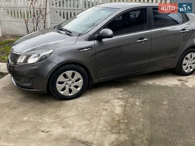 Серый Киа Рио, объемом двигателя 1.4 л и пробегом 195 тыс. км за 6500 $, фото 1 на Automoto.ua